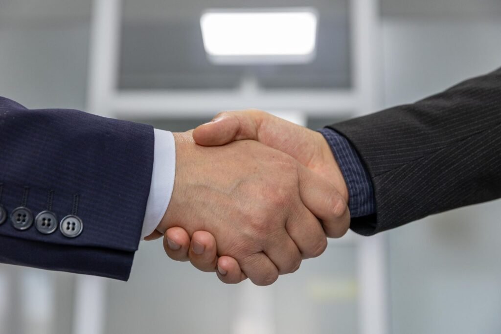 Business handshake signifying partnership and trust