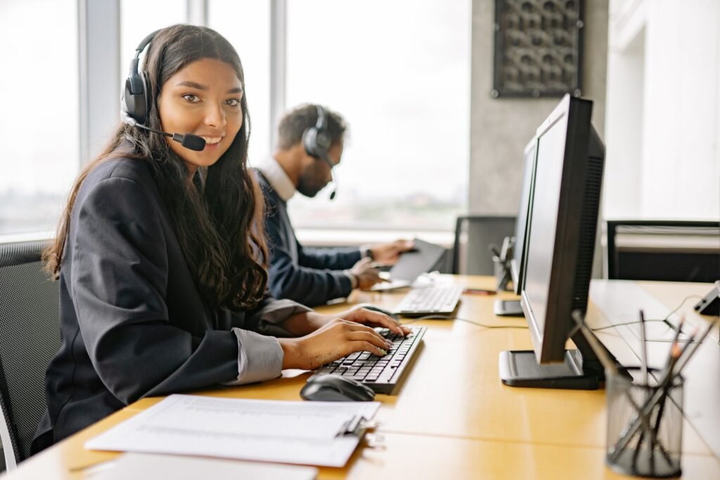 Smiling support agent ready to answer customer queries