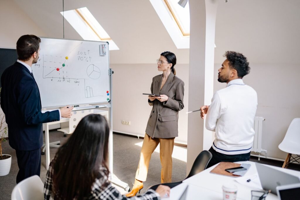 Professionals in a collaborative strategy meeting for digital marketing planning
